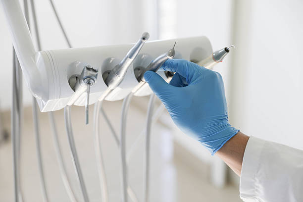 Professional Root Canal Treatment technician working in Dothan, AL